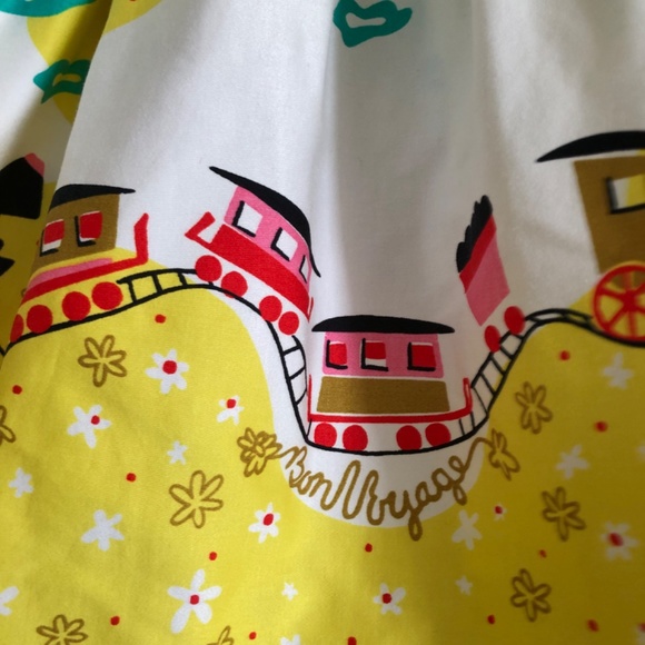 Pinup Couture Jenny Skirt in Mary Blair "Bon Voyage" Yellow Train Print, Small - Picture 5 of 10